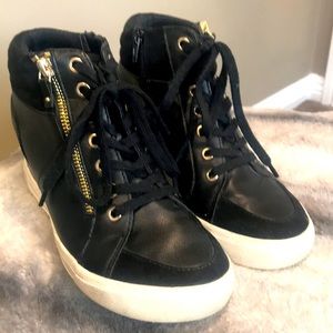 Aldo Hightop wedge sneakers w/ gold zipper detail.